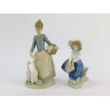 A Lladro porcelain figure modelled as girl feeding two ducks, 25cm high, and a further figure of a