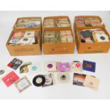 An extensive collection of 45rpm single records, rock, pop, punk, etc. (6 boxes)