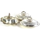 Three silver plated tureens, to include a pair, each with a beaded handle and gadrooned borders