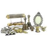 A collection of metalware, an Indian silvered metal and brass scroll holder, various other