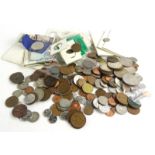 A quantity of British and foreign coins, to include a small amount of silver, various crowns, bank