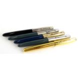 Five various Parker fountain pens, to include an example with gold plated and engine turned body and