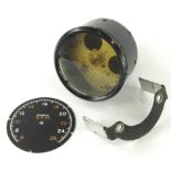 An early and rare Smiths MK162 tachometer, with a circular Arabic dial, marked 100's rpm, in a black