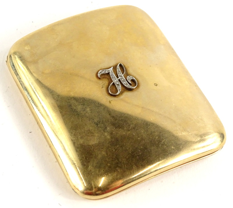 A 9ct gold cigarette case, of plain curved design, bearing embellished H initial to the front set