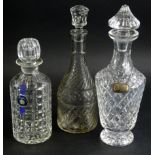 A crystal decanter, of shouldered tapering form, with shaped stopper, 35cm high, a 20thC Royal