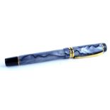 A Parker Duofold grey simulated marble and black fountain pen, with gold plated mounts, the nib