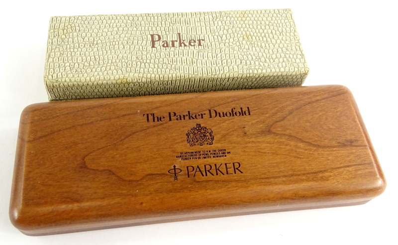 A Parker Duofold Centenary box, and another Parker box decorated to simulate reptile skin, in