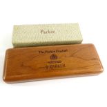 A Parker Duofold Centenary box, and another Parker box decorated to simulate reptile skin, in