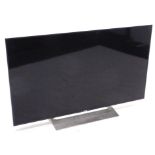 A Sony Bravia 4K 49 inch Android TV, with original box.