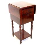 A 19thC mahogany work table, the rectangular drop leaf top with a channeled edge, above a frieze