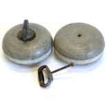 A pair of Scottish granite curling stones, each with silvered metal mounts and wooden handle, 26cm
