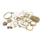 A quantity of mainly Indian and Eastern white metal, including bangles, slave and torc bracelets,