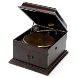 An Itonia vintage wind up gramophone, in oak case, with chrome plated mounts, on a moulded