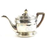 A George III Scottish silver teapot and stand, of oval form with horn knop and ebonised handle,