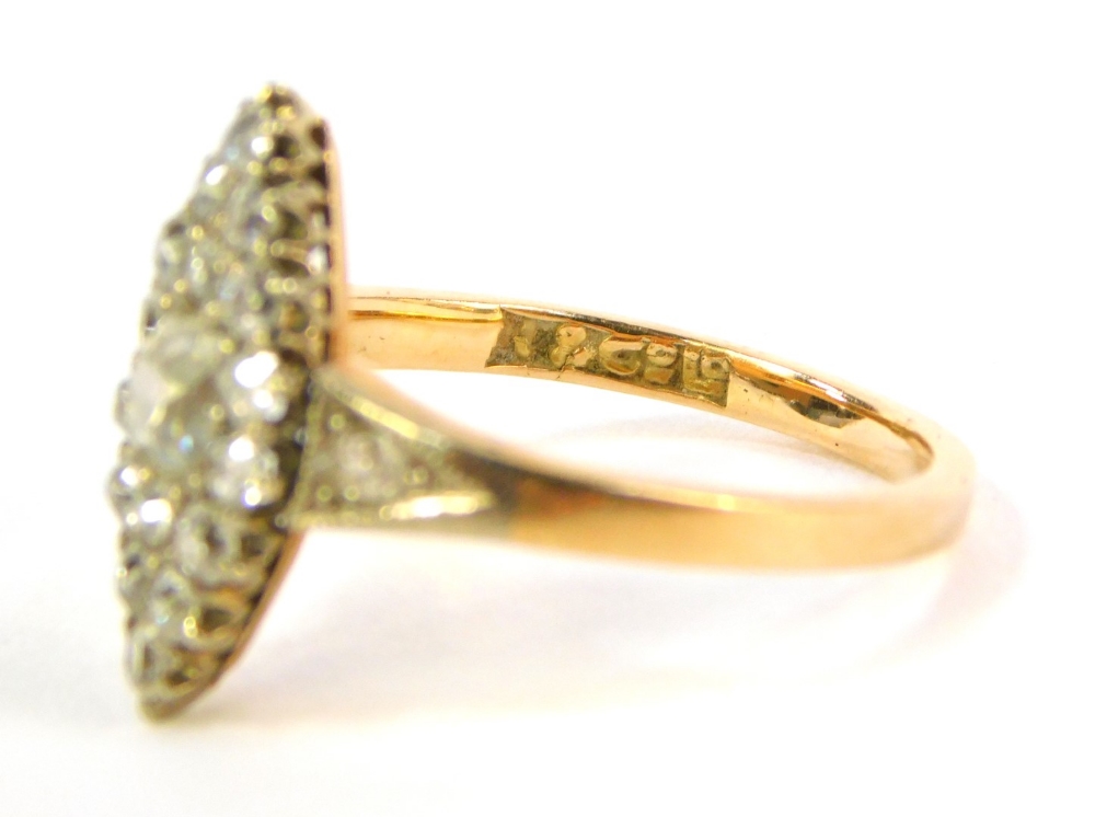 An 18ct gold diamond marquise cluster ring, set with old cut stones to the shoulders and mount, 3.1g - Image 3 of 3