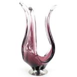 A Czech purple and clear glass centre piece, with shaped arms, on a polished aluminium base, 40cm