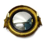 A 19thC giltwood and gesso girandole, the circular frame with moulded decoration, surrounding a