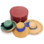 Various ladies hats, to include straw hats, mid 20thC red leather hat box, etc., (a quantity).