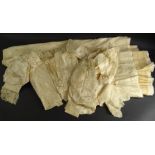 Various Victorian worked child's linen, dresses, waistcoat, with tassel linen cuffs, other jacket,