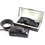 An Olympus MJU Zoom 105 camera, a further Olympus A11 XA2 camera, 13cm wide, in fitted case (2).