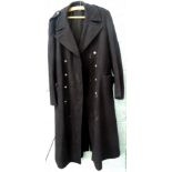 A Lincoln Corporation gentleman's overcoat, with engraved buttons, bars to the epaulettes or