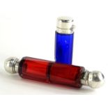 A continental Bohemian type double ended ruby tinted scent bottle, with silver coloured metal mounts
