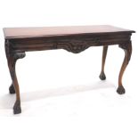 An eastern hardwood side table in George III style, the rectangular top with a moulded edge above