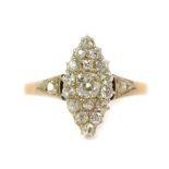 An 18ct gold diamond marquise cluster ring, set with old cut stones to the shoulders and mount, 3.1g