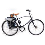 A Pashley X Paramount gentleman's bicycle, with a navy frame, Brooks seat and single pannier.