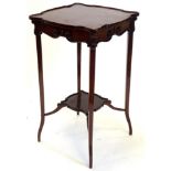 An Edwardian mahogany occasional table, the square top with a raised gallery and shaped border on