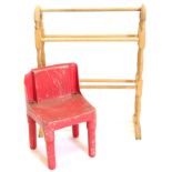 A stained beech towel rail, and a moulded plastic childs chair.