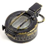 A T.G. Co. Ltd of London Second World War compass, in brass and blackened metal, dated 1942 Mk