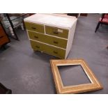 A pine chest of two short and two long drawers and a gilt firescreen, formed from a picture frame.