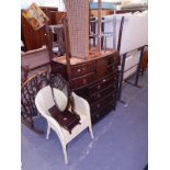 A bow fronted mahogany chest of four drawers, a matching dressing table, narrow stool, Prestige