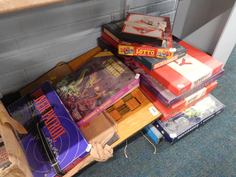 Various games, to include Monopoly, Diplomacy, Dungeons and Dragons, a chess board made from