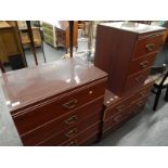 A collection of modern mahogany effect bedroom furniture, comprising five drawer chest of drawers