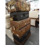 A collection of three canvas and wooden trunks and three black painted metal trunks (AF, 6).