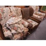 Two similar 1920's/30's wingback armchairs, upholstered in tapestry type fabric, later loose