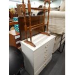 A white melamine chest of five drawers and a beech towel rail, (2).