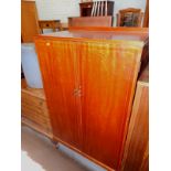 An early 20thC mahogany gentleman's compactum type wardrobe or cupboard, with boxwood strung