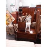 A turned beech standard lamp, triple dressing table mirror, oak umbrella stand, painted stool,