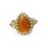 A Silver Shinyanga sunstone and yellow sapphire ring, in a pear shaped design, sunstone 2.62cts,