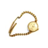 A Marvin lady's 9ct gold circular cased wristwatch, white dial bearing Arabic numerals, subsidiary