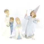 A Lladro porcelain figure modelled as Magical Moment, 06171, boxed, together with a Lladro figure