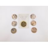 Seven Elizabeth II five pound coins, comprising 1997 Elizabeth & Phillip (5), 2008 Guernsey, and