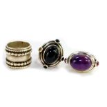 A Julia Booth silver and cabochon gem set ring, size O, similar silver and cabochon set ring, one