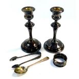A pair of George V loaded silver candlesticks, Chester 1927, 14.13oz all in, 15.5cm high, together