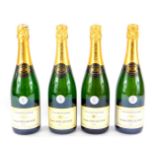 Four bottles of Louis Delaunay Champagne.