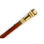 A Georgian malacca lady's pomander cane, the ivory handle with silver pique decoration, unscrewing