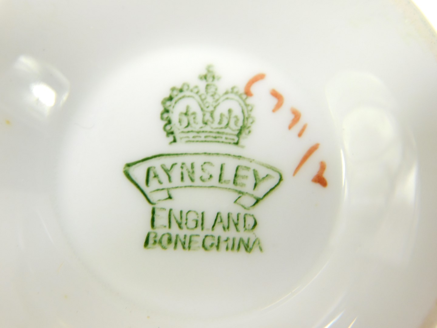 An Aynsley porcelain tea service, gilt decorated with mistletoe against a light green and peach - Image 3 of 3